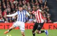 Ilustrasi jon aramburu untuk artikel Jon Aramburu, pemilik tak terbantahkan nomor 2 Real Sociedad
